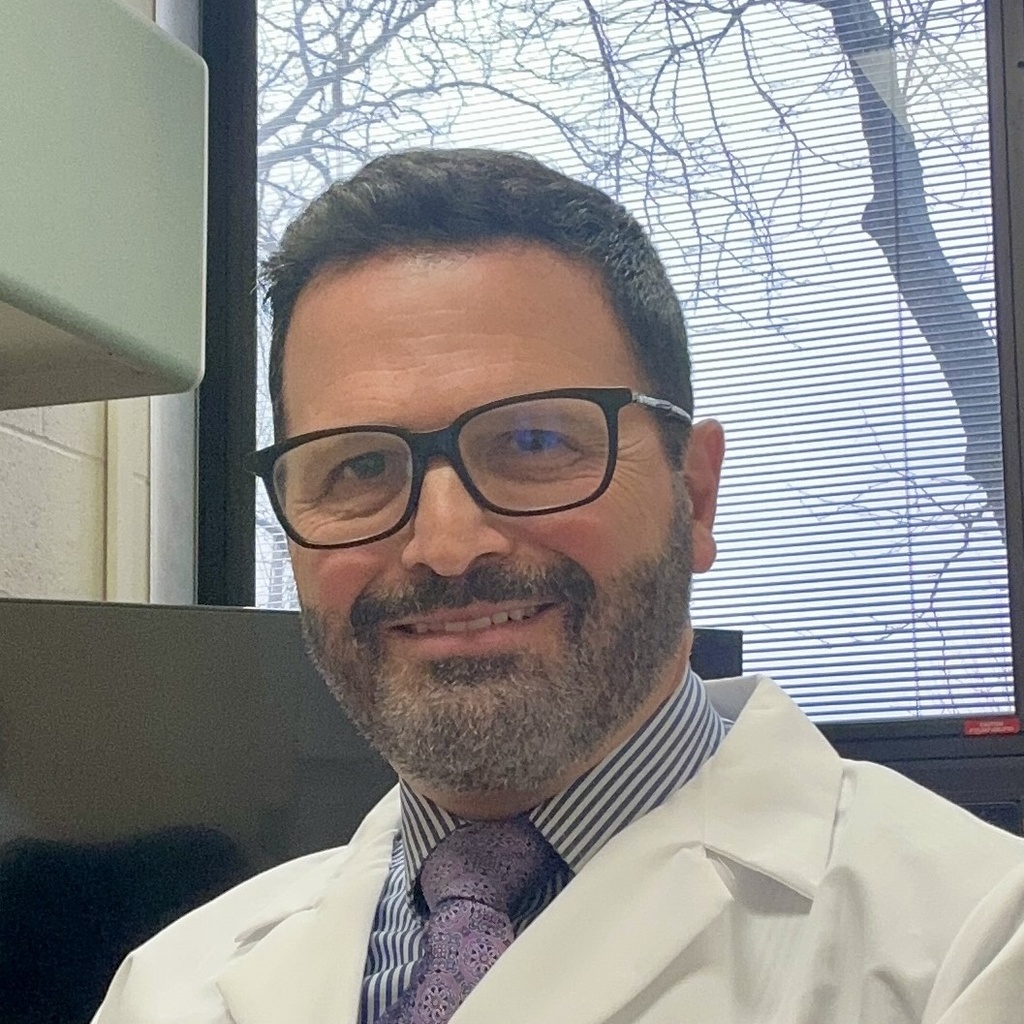 photo of Dr. Leyser in lab coat