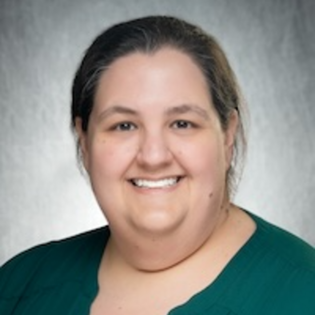 Photo of Adele Stewart in Green top on Grey background